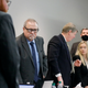 BRUNSWICK, GEORGIA - NOVEMBER 19: Defendants William "Roddie" Bryan, Travis McMichael and Gregory McMichael, stand during the trial of Ahmaud Arbery's alleged killers at Glynn County Superior Court on November 19, 2021 in Brunswick, Georgia. Greg McMichael, his son Travis McMichael, and a neighbor, William "Roddie" Bryan are charged with the February, 2020 fatal shooting of 25-year-old Ahmaud Arbery. (Photo by Octavio Jones-Pool/Getty Images)